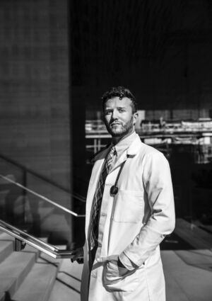 Portrait of Corey Deburghgraeve, an anesthesiologist at UIC Hospital in Chicago who is currently incubating Covid-19 patients. Portrait taken downtown Chicago.