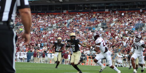 Running back Alex Fontenot runs the ball close to the goal line. (Lauren Irwin/The Bold)