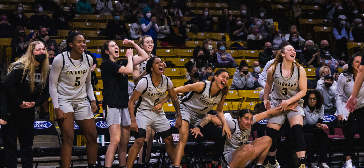 The CU Women's Basketball team celebrating after the team scored at the Colorado vs Washington game in Boulder, CO. Feb. 6, 2022. (Harry Fuller/The Bold)