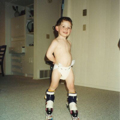 As a toddler, Braden tries on his pair of skis. (Photo Courtesy of Tami Gottsegen)