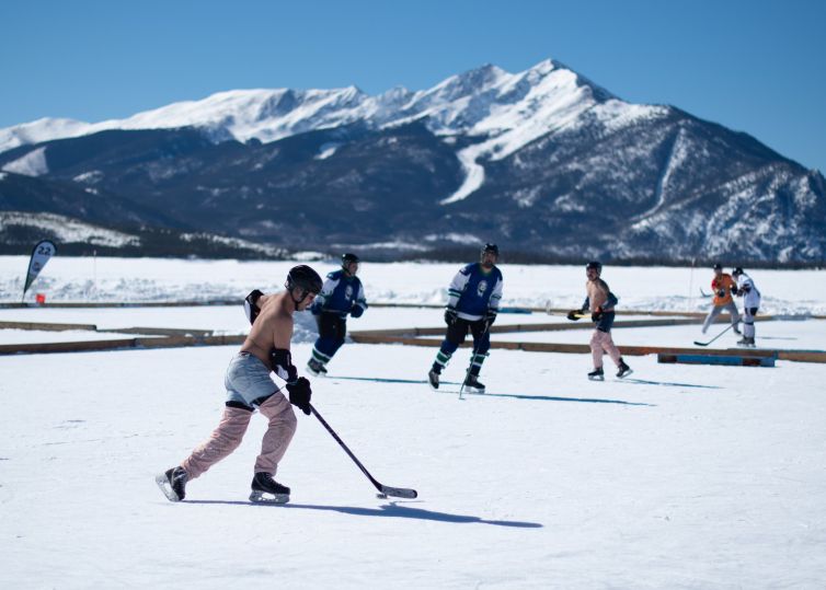 Teams Nevernude and BFM play at the Pabst Blue Ribbon Colorado P