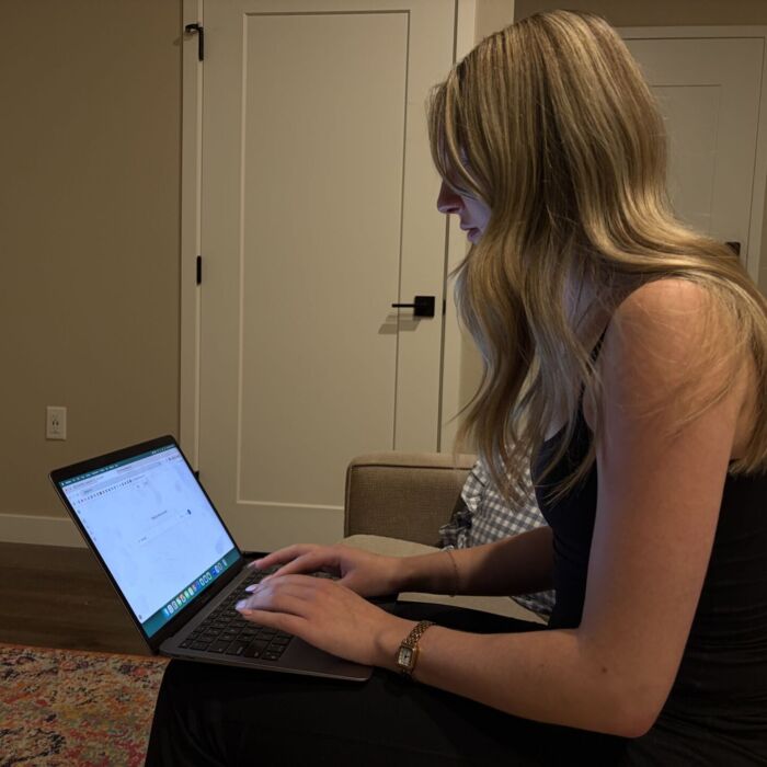 CU Boulder student Sophia Bandi uses her laptop in her room on October 18, 2026 to complete a homework assignment. As artificial intelligence becomes more common in students’ daily lives, Bandi’s use of technology reflects how students interact with digital tools for schoolwork. (Photo by Catherine Ward)