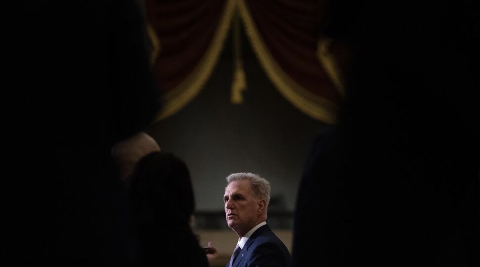 House Speaker Kevin McCarthy speaks to journalists flanked by fellow Republican members outside the House Chamber, at the U.S. Capitol on Tuesday, September 26, 2023.(Tom Brenner for The Washington Post via Getty Images)