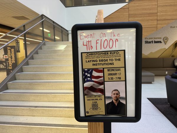 A sign announcing Chris Rufo's talk on Wednesday, Jan. 17, 2024, on the first floor of the CASE building. (Henry Larson/The Bold)