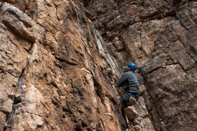 Chris Mendez works through the crux on the route Large Marge at the 2023 Craggin' Classic in Cañon City, CO on Oct. 28. (Nathan Thompson/CU News Corps) 