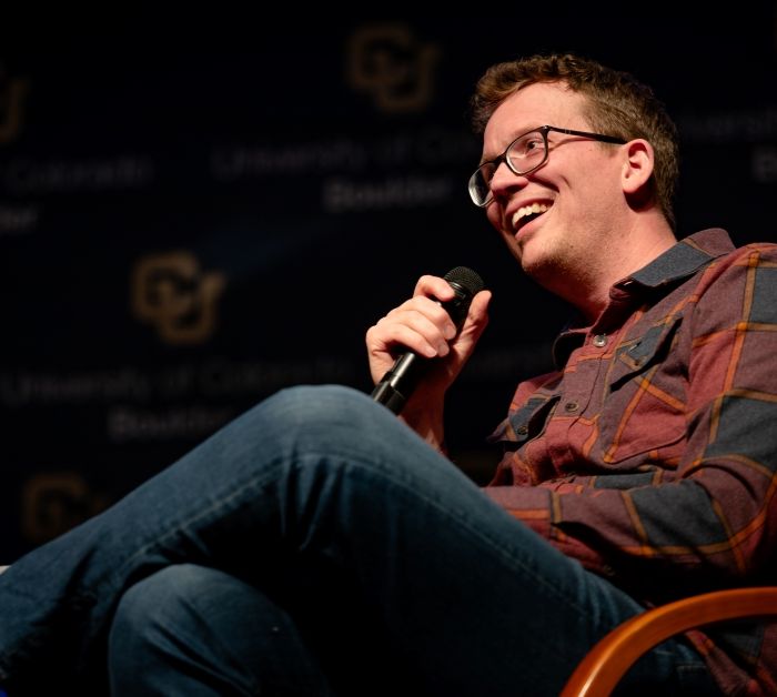 Hank Green speaks to a sold-out crowd at Macky Auditorium on Tuesday, March 19, at the invitation of the CU Boulder Distinguished Speakers Board for their semesterly event. (The Bold/Nathan Thompson)