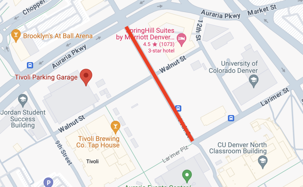 11th St. was barricaded by police vehicles between Auraria Parkway and Larimer Street. The demonstration, taking place on the Tivoli Quad in front of the Tivoli Student Union, is marked by the Tivoli Brewing Co. Tap House in the Google Maps screenshot. (Gabriella Isukh/The Bold)
