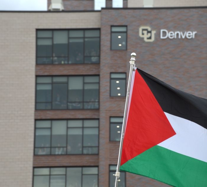 palestinian flag in front of cu logo2