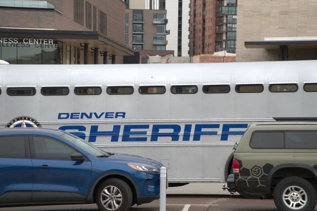 The Denver Sheriff's department transport bus parked outside Tivoli Quad on Friday. (Cooper Baldwin/The Bold)