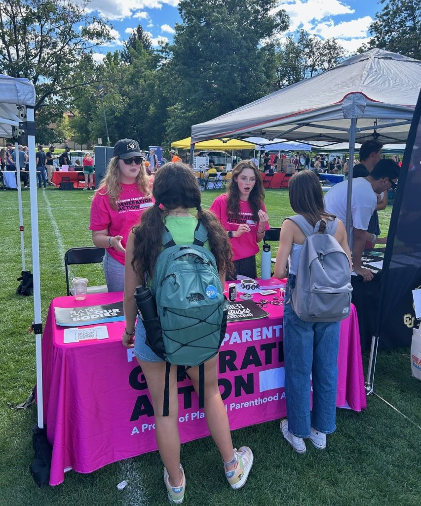 Members of Buffs for Reproductive Rights, The University of Colorado Boulder’s reproductive rights club, tabling at the Be Involved Fair. (Simone Adhikari, The Bold)