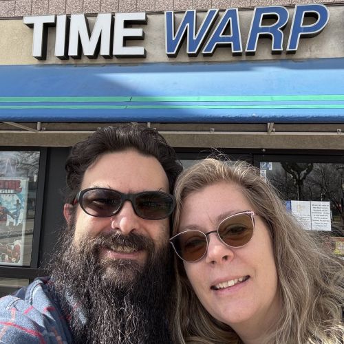Kelly and Dottie Cooke take a selfie outside the old Time Warp Comics & Games location in Boulder, Colo., on Jan. 1, 2025. It was their first day as new owners of the comic book store. Photo by Kelly Cooke