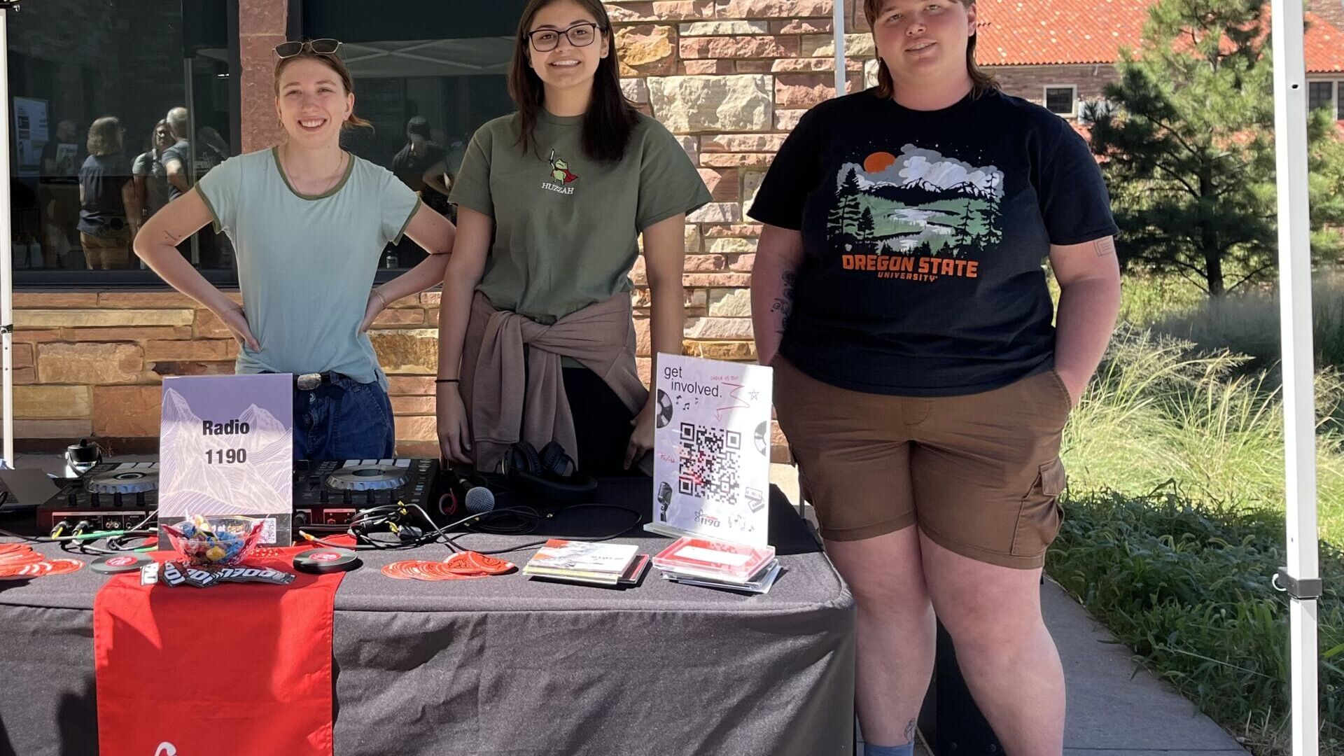 Radio 1190 members outside of CASE building in 2026 Radio 1190’s Juliana Krigsman, Rian Korb and Mars Williams work a table at the CU CMDI Student Involvement fair in September 2026. (Photo by Quinn O'Donnell)