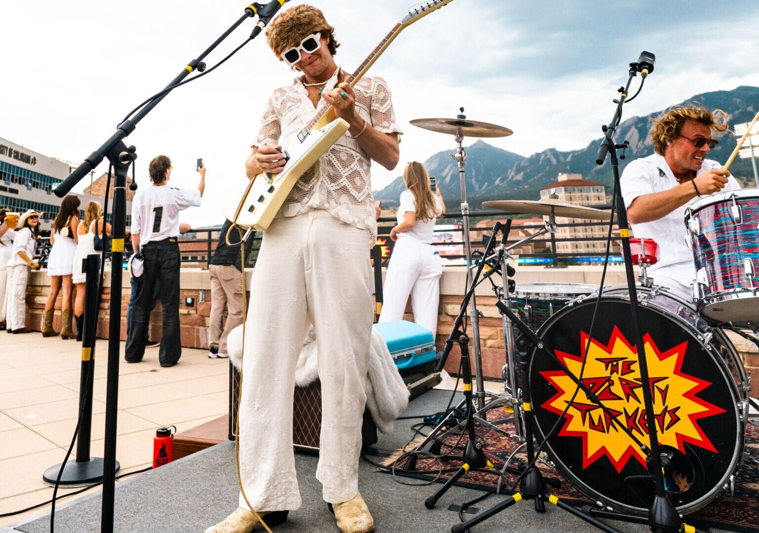 Dirty Turkeys play at Folsom on Sept. 12, 2026 (guitarist and drummer) Dirty Turkeys guitarist Russ Hansen and drummer Ty Tullar perform during CU football's home opener on Sept. 12, 2026, at Folsom Field. (Photo courtesy of CU Athletics)
