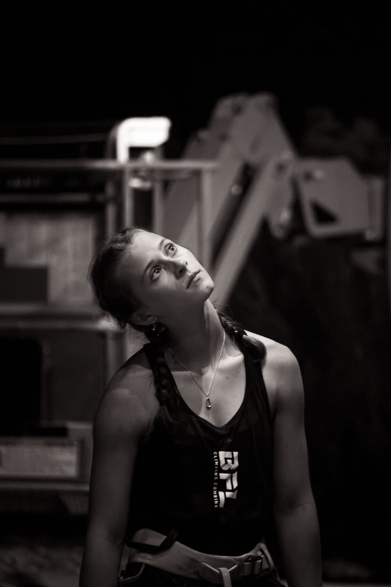 Vivienne Cerne gazes upward, contemplating what happened moments earlier on the wall at the Beast Fingers League (BFL) climbing competition at Longmont Climbing Collective in August 2026. (Photo by Harley Parsons)