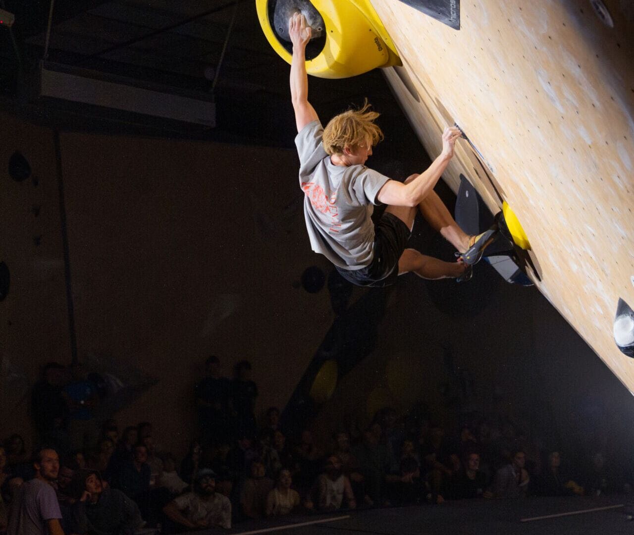 The audience holds its breath as Malachi Donahoe makes it further than anyone else had at the Heart of Stone climbing competition in Loveland, Colorado, in September 2026. (Photo by Harley Parsons)